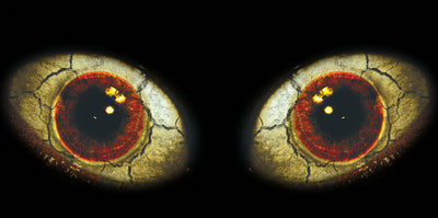 Eyeball-style headlight graphics with red iris and cracked gold texture