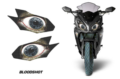 Headlight graphic decal set with two blue-eyed designs on a motorcycle front fairing