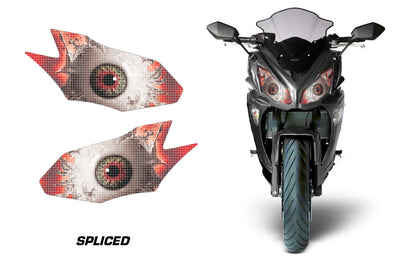 Headlight graphic decal set with red-and-gray eye designs on a motorcycle front fairing