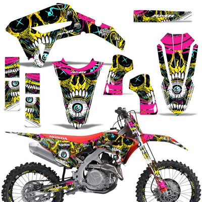 Off-road motorcycle graphics kit with neon yellow and pink skull decals for front and side panels