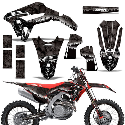 Off-road motorcycle graphics kit with black and white skull decals for front, side, and rear panels