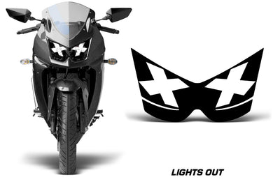 Black lights-out headlight graphics with star eye decals and glowing outline