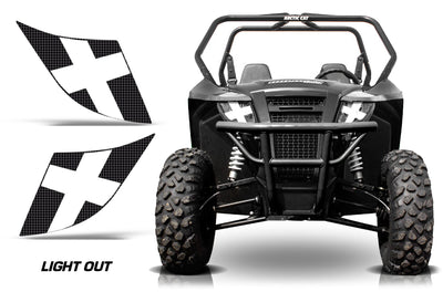 Front view of black off-road utility vehicle with white X-like LED headlight glow and grille