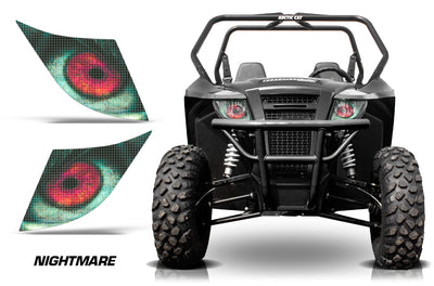 Front view of black off-road utility vehicle with red circular LED headlight pattern and grille