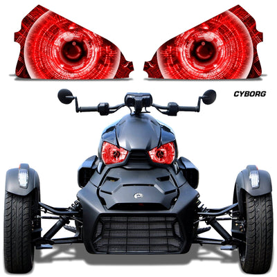 Headlight eye graphics with red glowing concentric eyes on a Can-Am roadster front