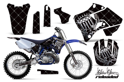 Motorcycle graphics kit with black base and white badge graphics on fender and panels