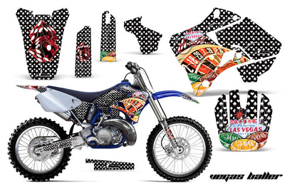 Yamaha dirt bike graphics kit with black, white, and red checkered skull designs